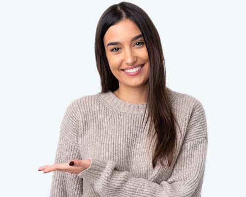 Smiling young woman who purchased a dental plan
