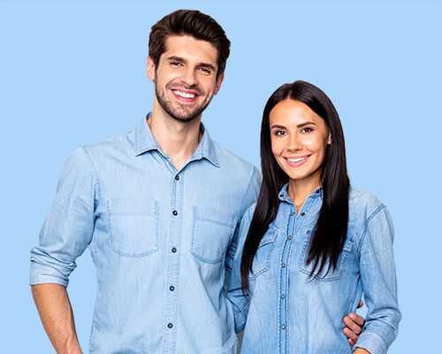 Young couple smiling and hugging
